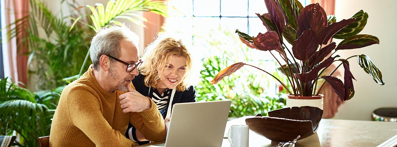 Couple planning travel online